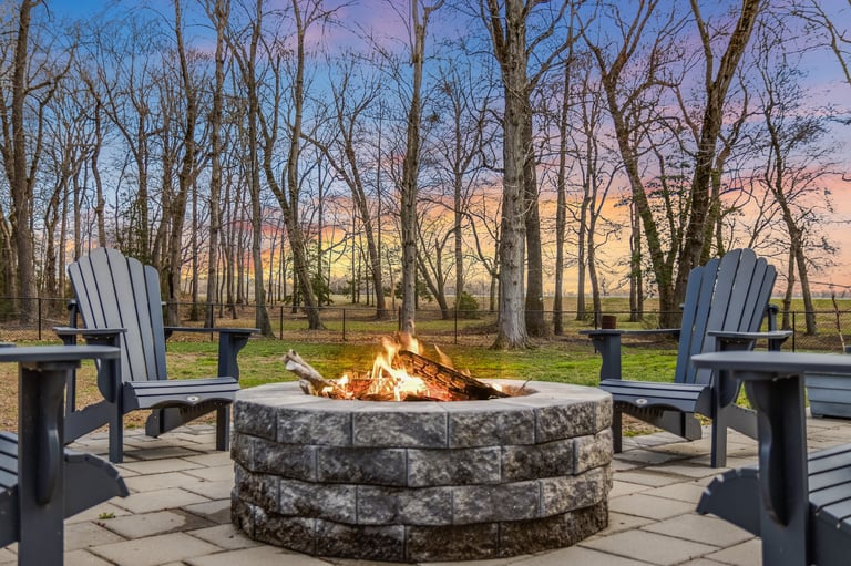 An evening spent by the fire pit with adirondack chairs